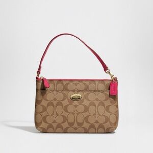 Coach signature brown and pink wristlet